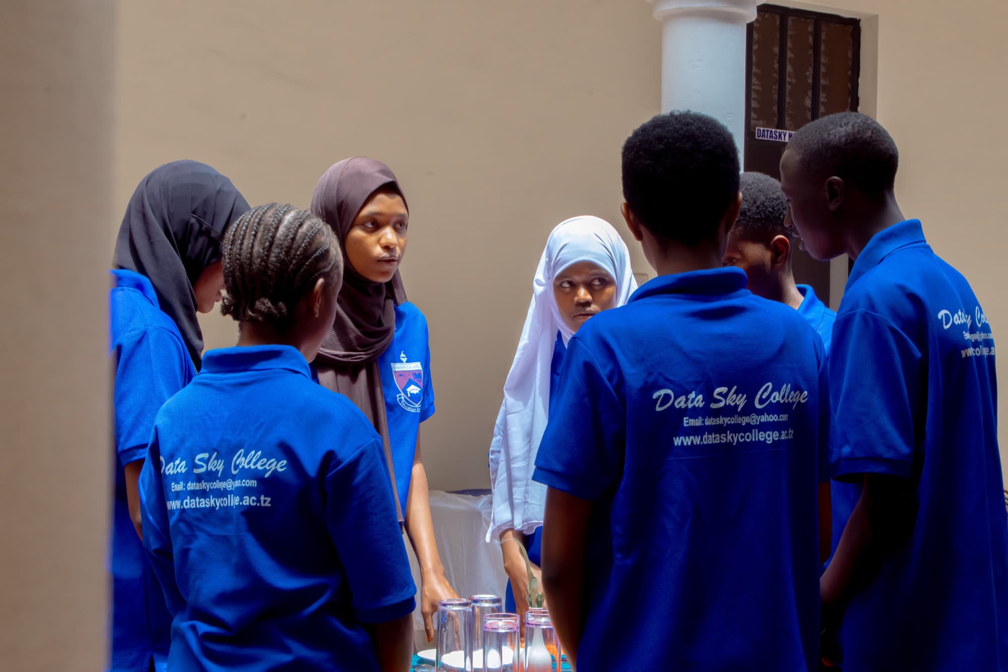 Datasky College students standing together outside a college building